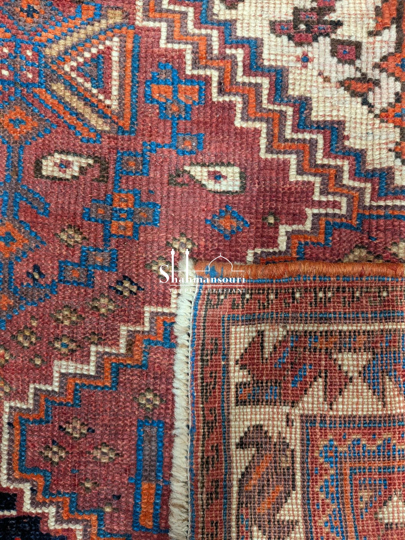Rectangular Afshar rug, 170 × 130 cm, with geometric medallions, multiple borders, and red, blue and ivory tones. - detail 3