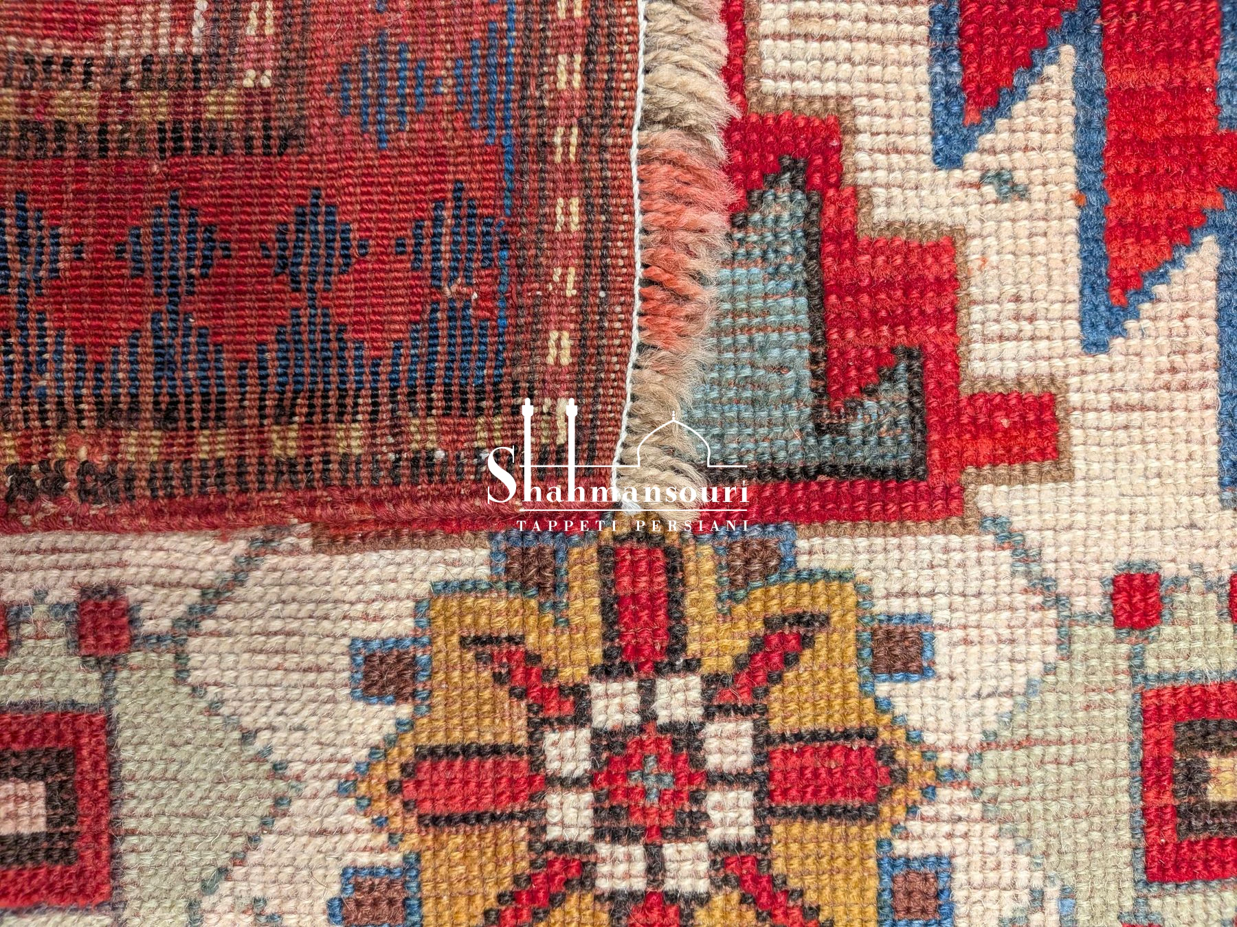 Rectangular Kazak rug with two geometric medallions, multiple patterned borders and short fringes. - detail 3