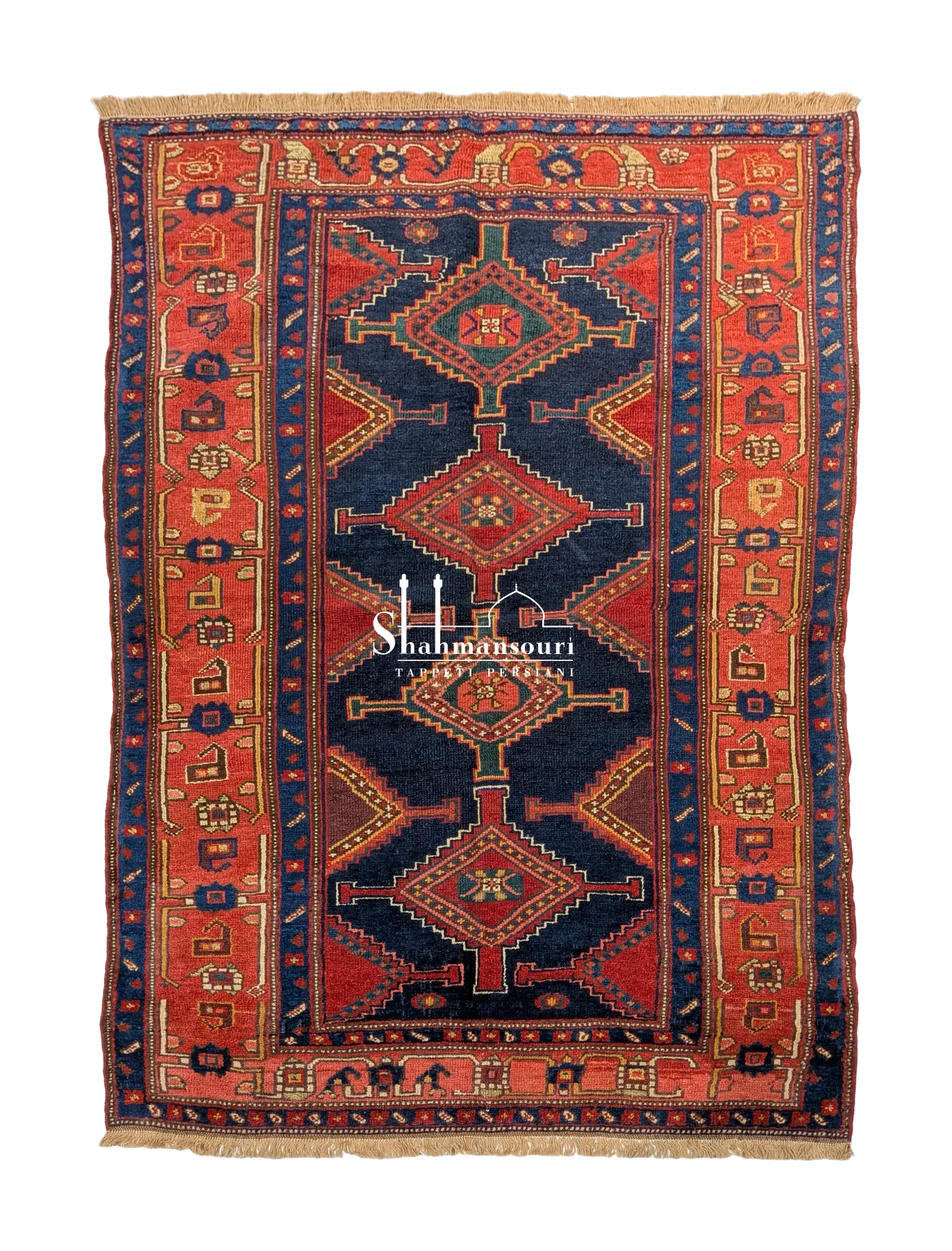 Kordi Persian wool rug with a dark blue field, four geometric medallions, red borders and pale fringes, 182 x 128 cm.