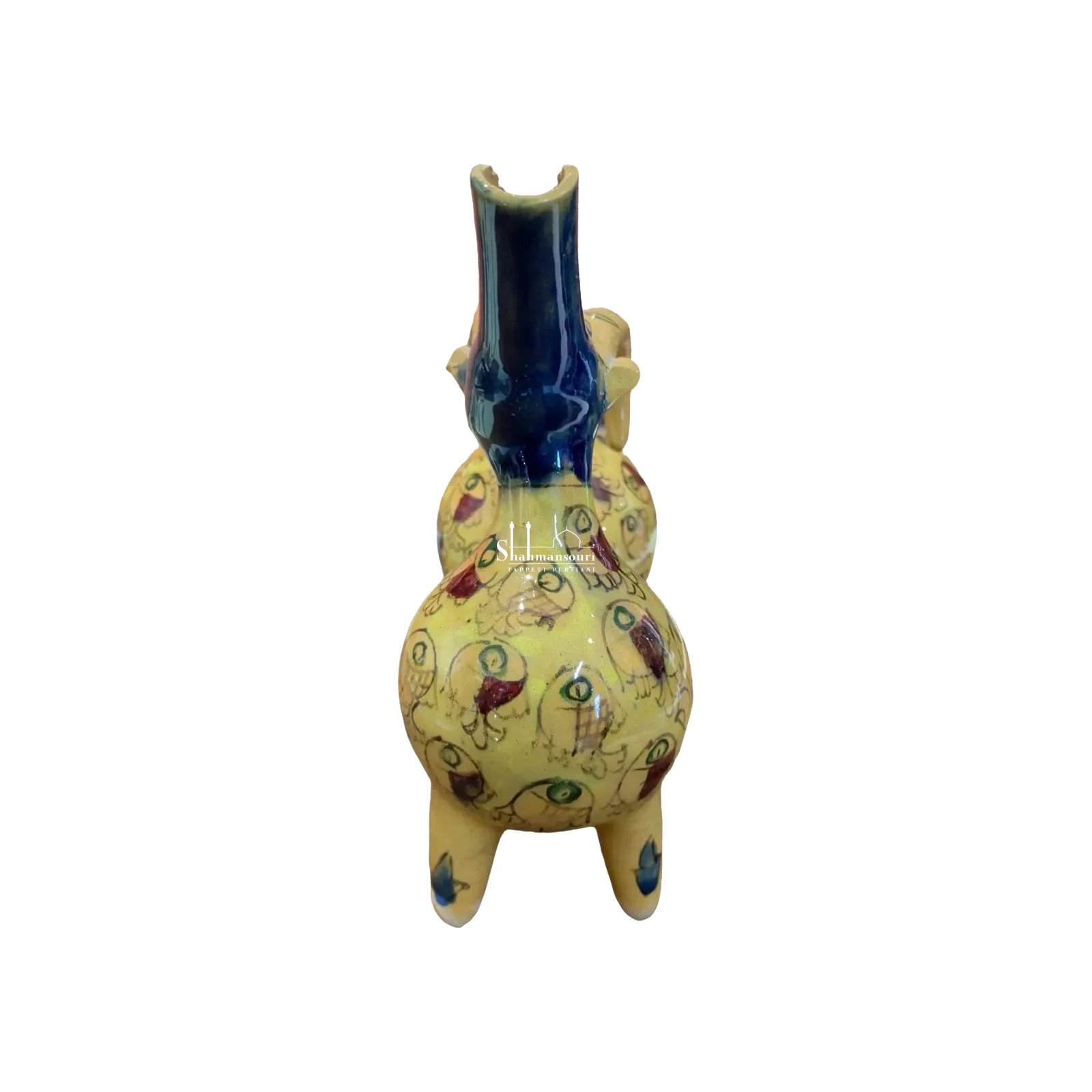 Statua in maiolica con corpo giallo decorato da pesci, quattro zampe corte, testa blu dal muso allungato e corna gialle ricurve. - dettaglio 3