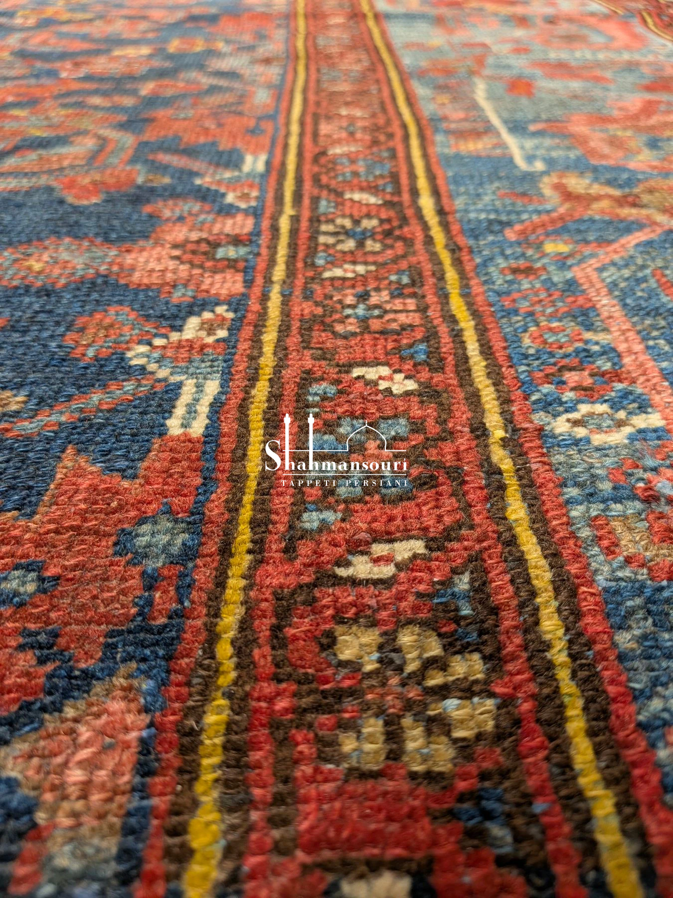 Rectangular Malayer rug, 181 x 129 cm, with a dark blue patterned field, light blue border and pale fringes. - detail 2