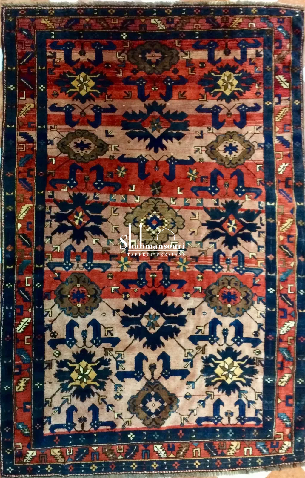 handmade Caucasian Baku rug with red and blue geometric motifs