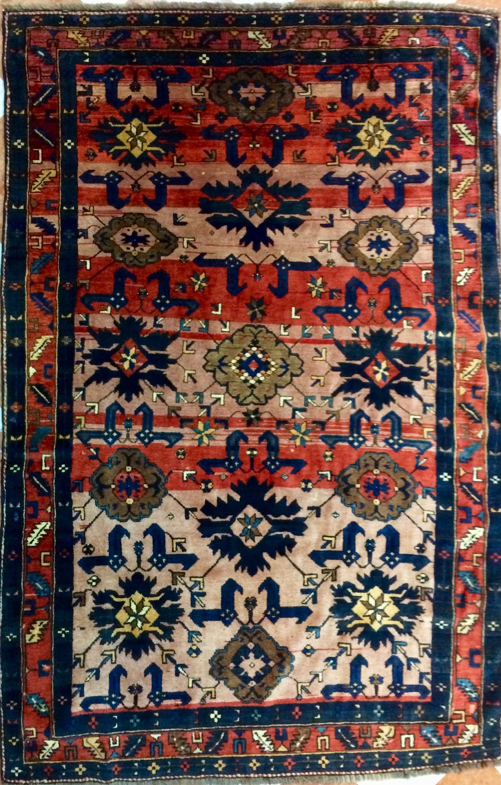 handmade Caucasian Baku rug with red and blue geometric motifs
