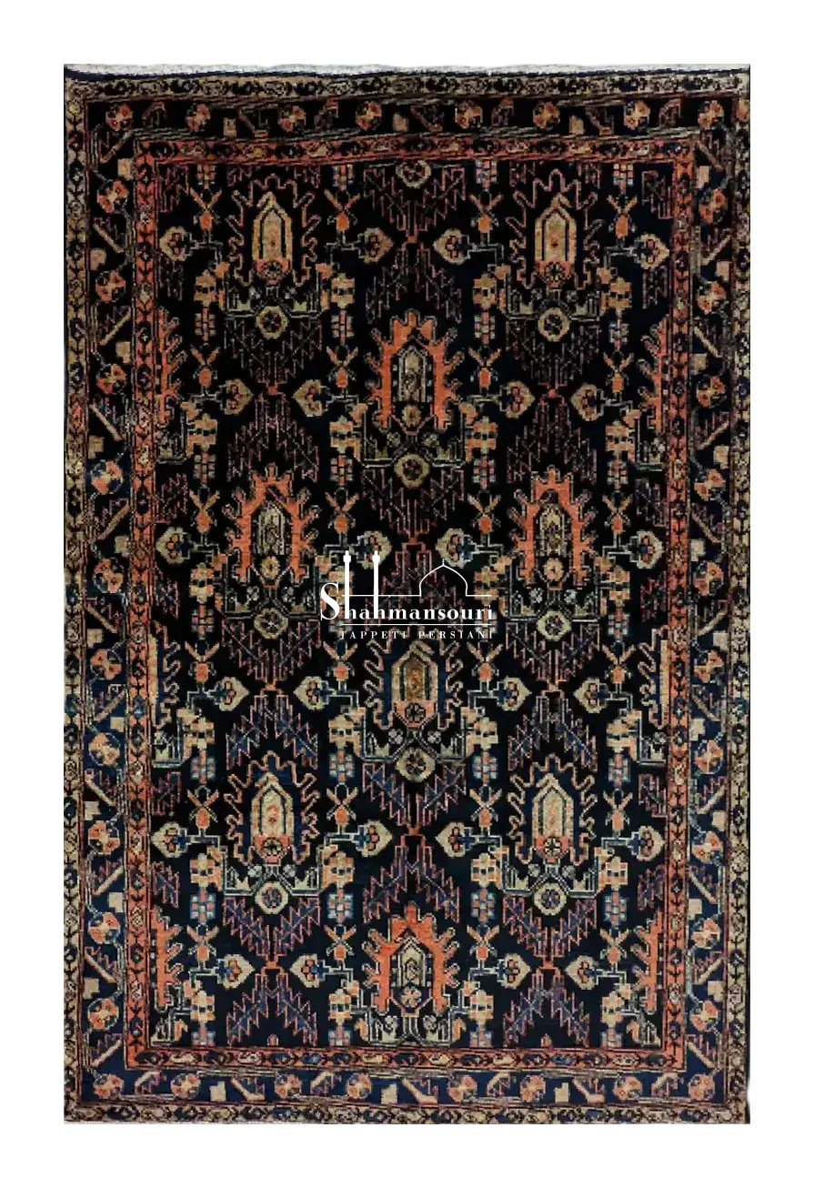 handmade Persian Burujerd rug with geometric all-over pattern on dark background