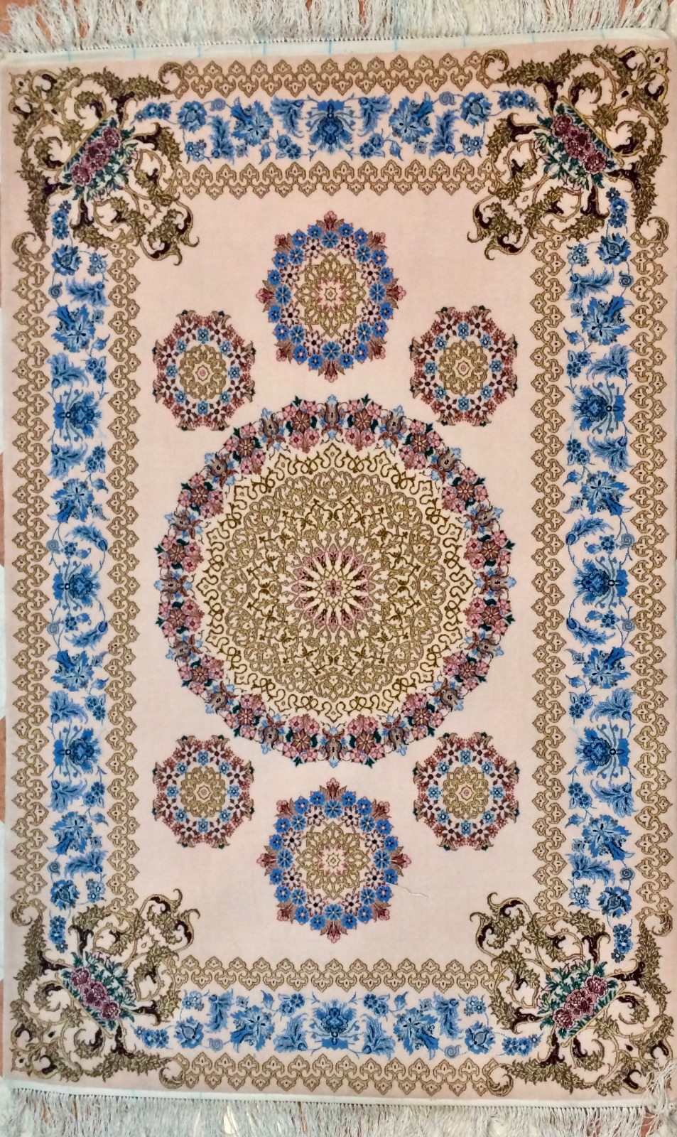 Isfahan Persian silk rug with floral motifs and central medallion