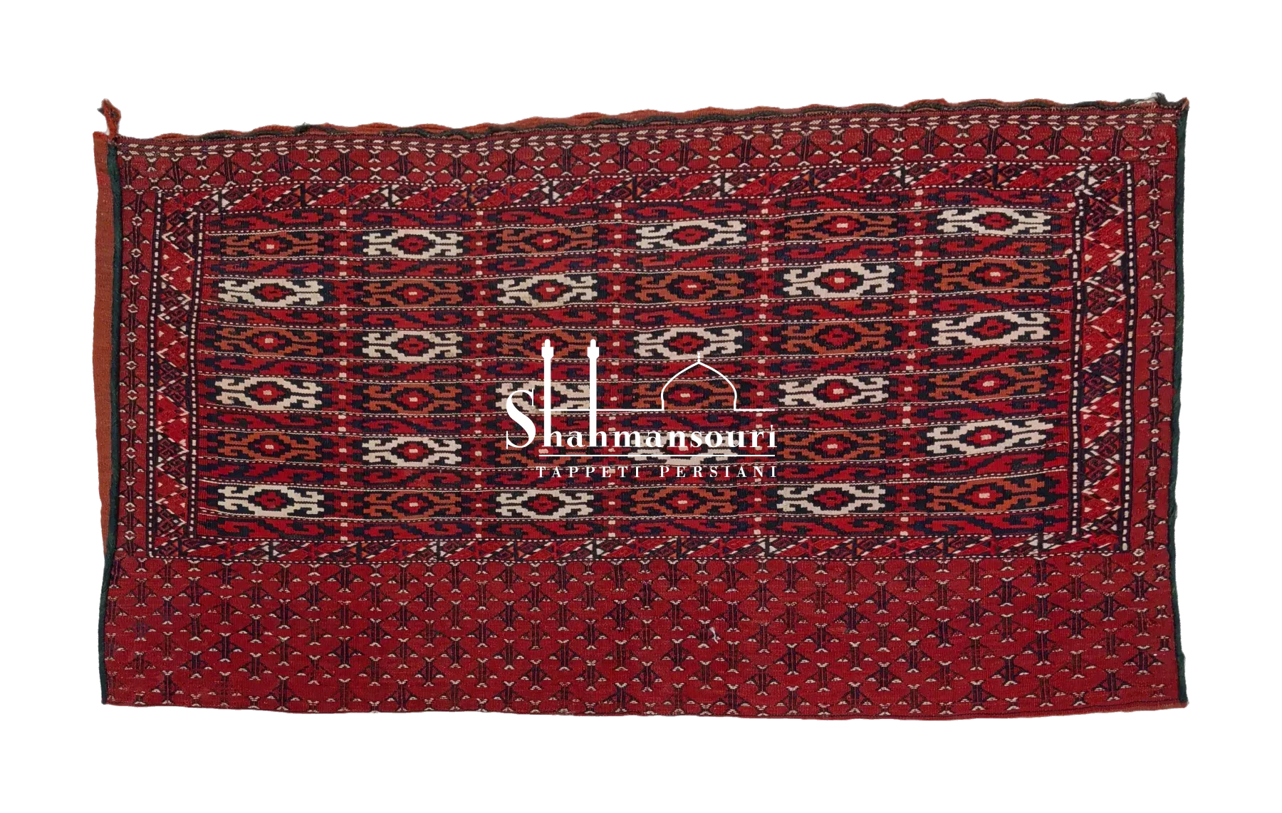 Turkmeno persiano con motivi geometrici avorio e arancio su campo scuro e ampia fascia laterale rossa decorata.