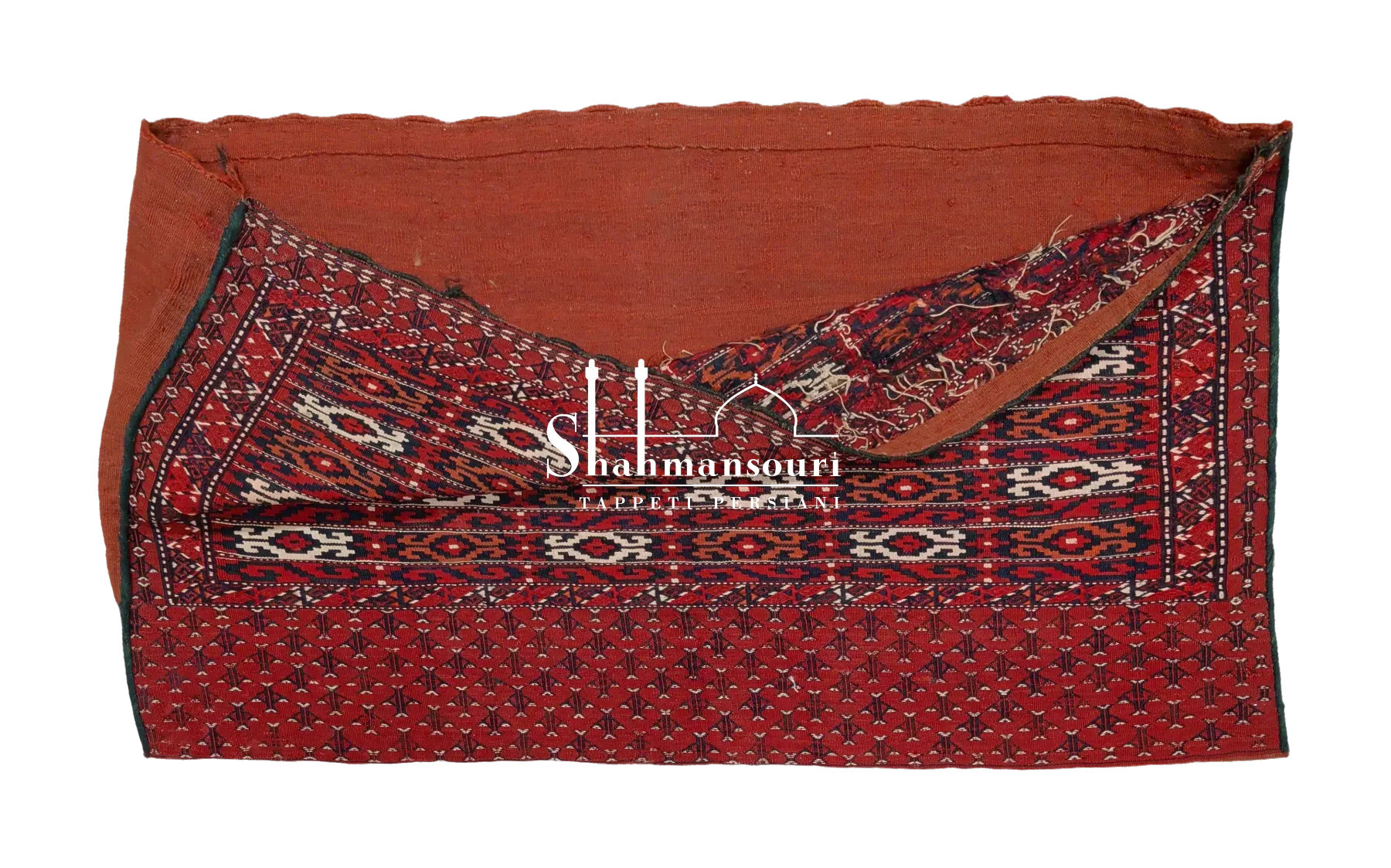 Turkmeno persiano con motivi geometrici avorio e arancio su campo scuro e ampia fascia laterale rossa decorata. - dettaglio 2